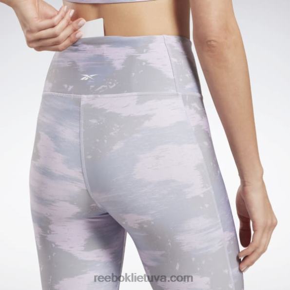 Reebok treniruotėms paruoštos Camo print pėdkelnės FTYF8480 violetinė migla moterys